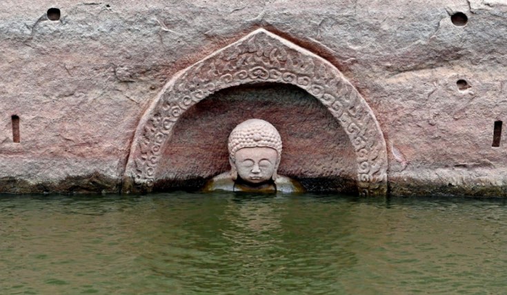 Ancient Buddha Discovered in reservoir, Report