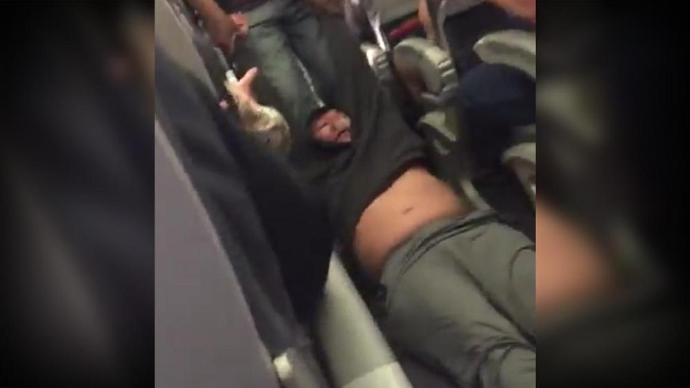 Man Removed From United Flight (CAUGHT ON VIDEO)