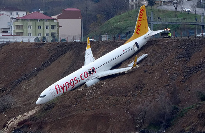 Plane skids off runway, gets stuck on cliff (Watch)
