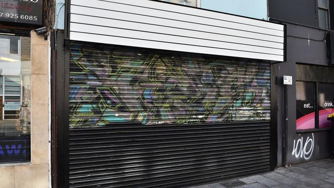 Banksy mural accidentally painted over by shop's new owners, Report